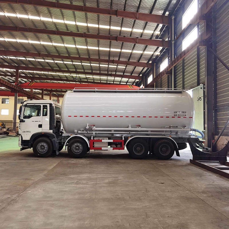 HOWO 28cbm corn Petroleum resin granule transport truck Front Side View
