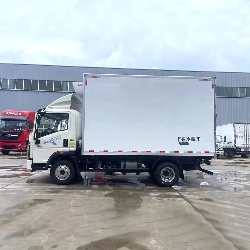 SINOTRUK HOWO 4*2 23m3 right hand drive refrigerator truck Side View