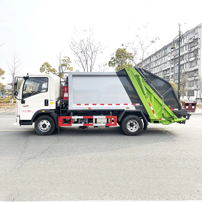 SINOTRUK HOWO 4*2 sanitation compressed garbage truck Front side view