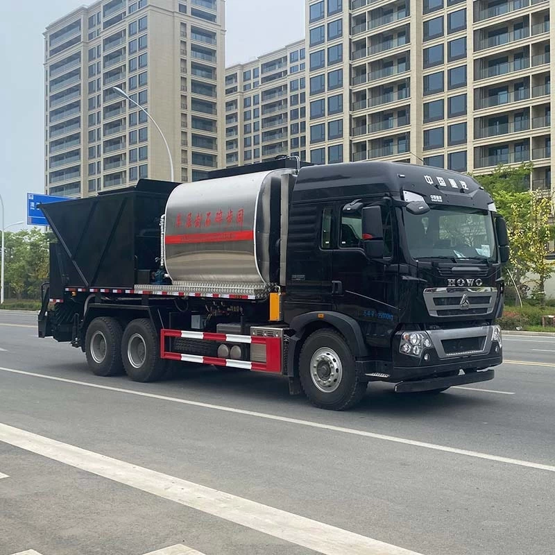 Howo 6x4 Asphalt Gravel synchronous spreader truck Oblique Front View