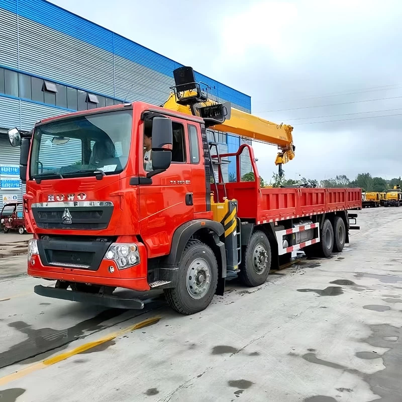 Howo 6x4 Dump 14 Ton Telescopic Boom Crane Truck Price Oblique Front View
