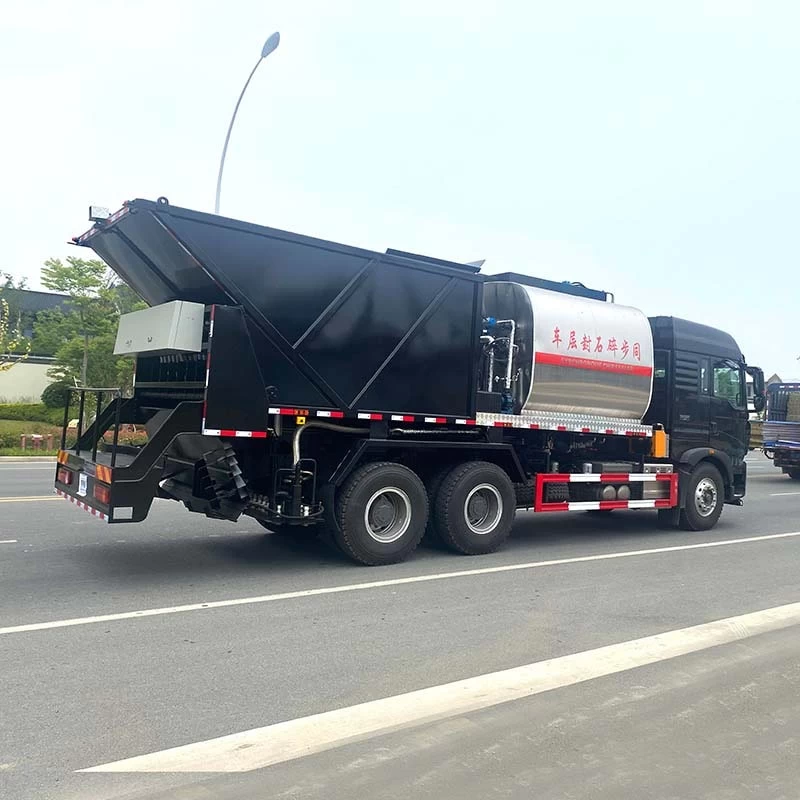 Howo 6x4 Asphalt Gravel synchronous spreader truck Oblique Back Plot