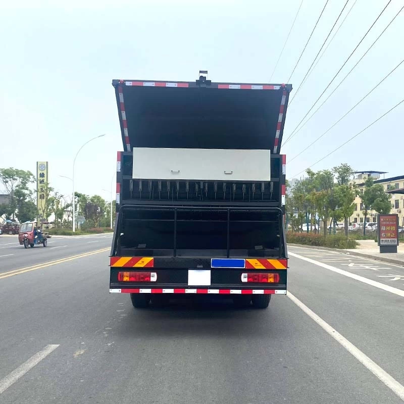 Howo 6x4 Asphalt Gravel synchronous spreader truck Back Image