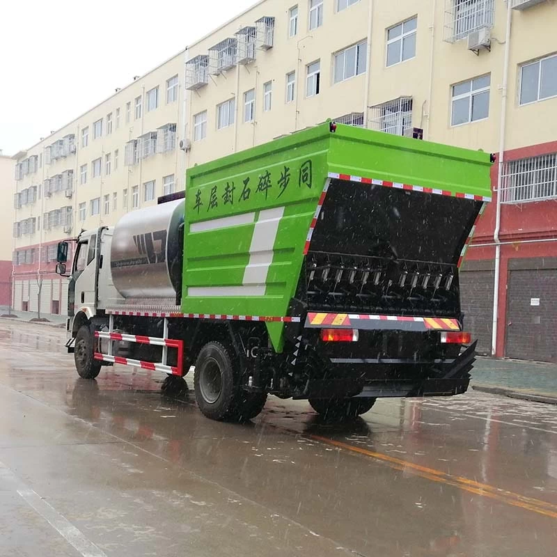 Faw 4x2 bitumen gravel synchronous spreader truck Oblique Back Plot