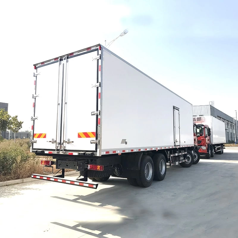 SINOTRUK HOWO 8*4 big capacity 56m3 refrigerator trucks Oblique Back Plot