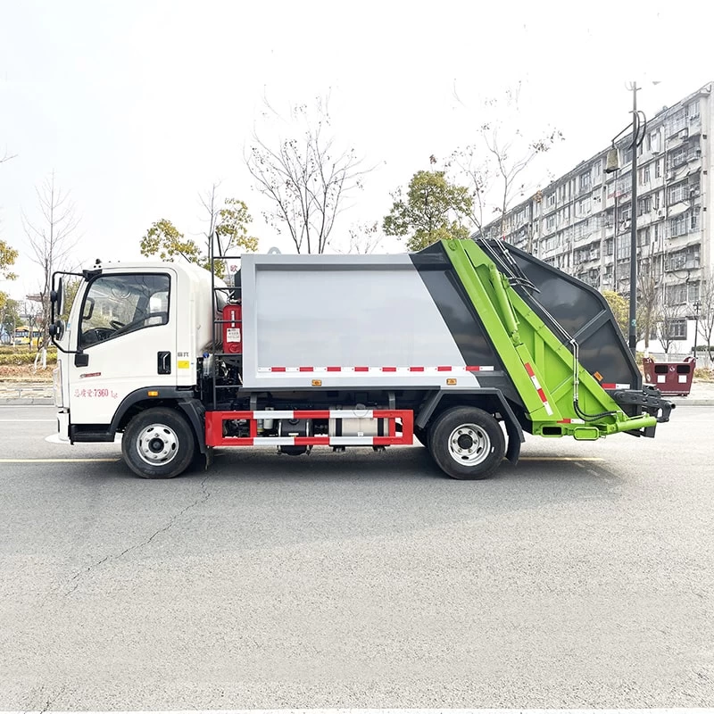 SINOTRUK HOWO 4*2 sanitation compressed garbage truck Front Side View