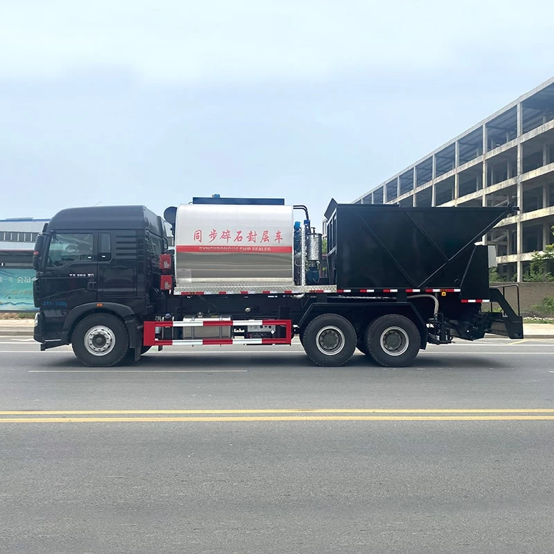 Howo 6x4 Asphalt Gravel synchronous spreader truck Front Side View