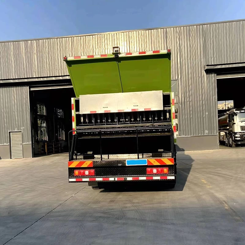 HOWO 8*4 asphalt synchronous crushed stone storage truck Back Image
