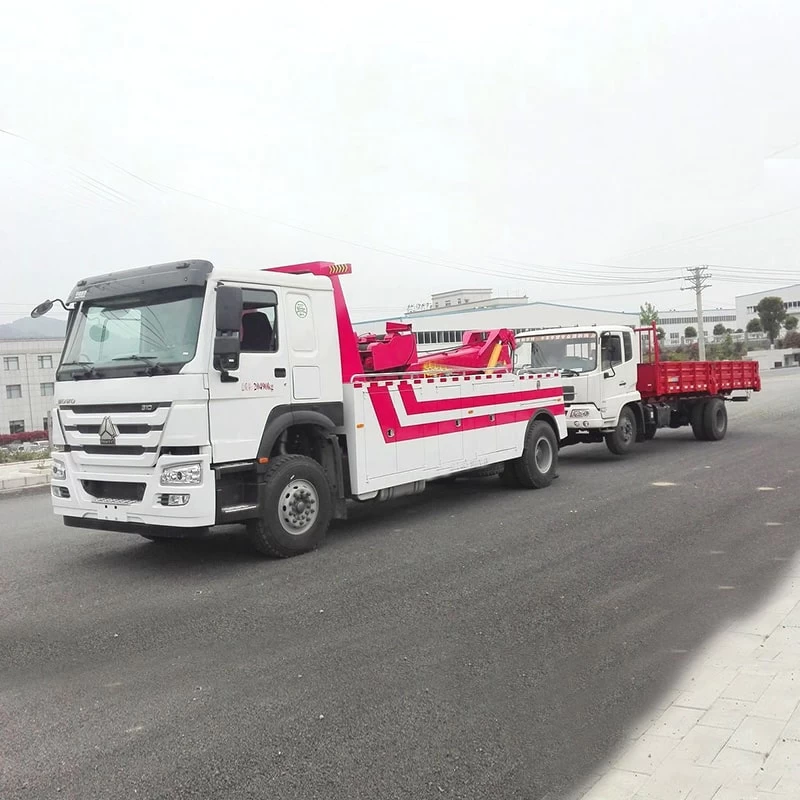 SINOTRUK 4*2 lifting & towing Road Rescue Wrecker Truck Oblique Front View 

