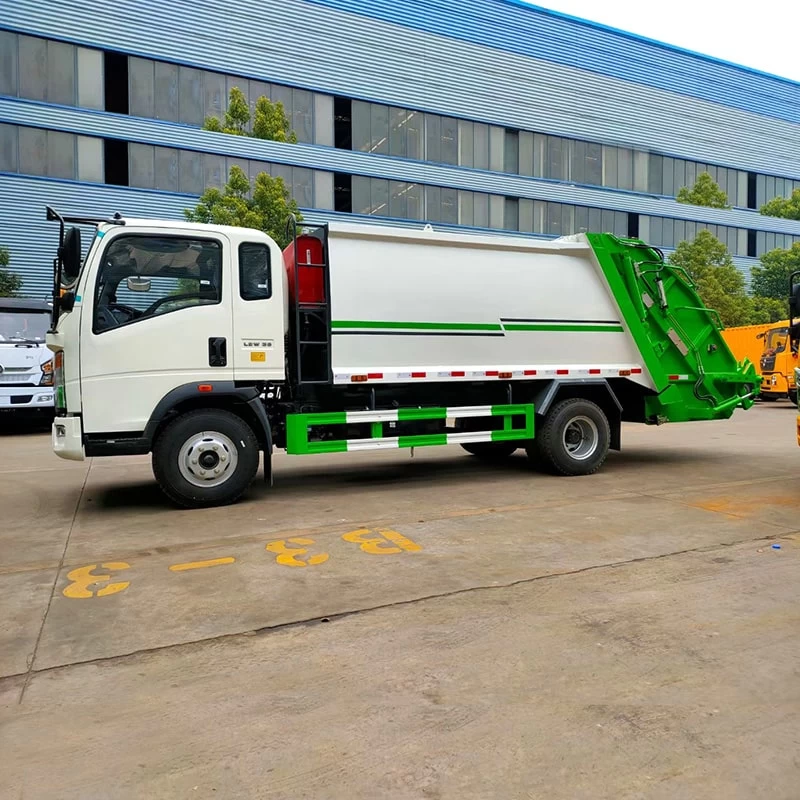 Howo 4x2 9 CBM Small Garbage Compactor Truck for Sale Front Side View