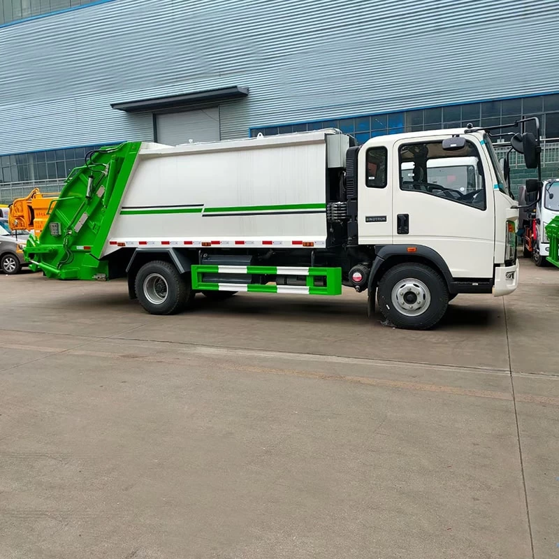 Howo 4x2 9 CBM Small Garbage Compactor Truck for Sale Front Side View
