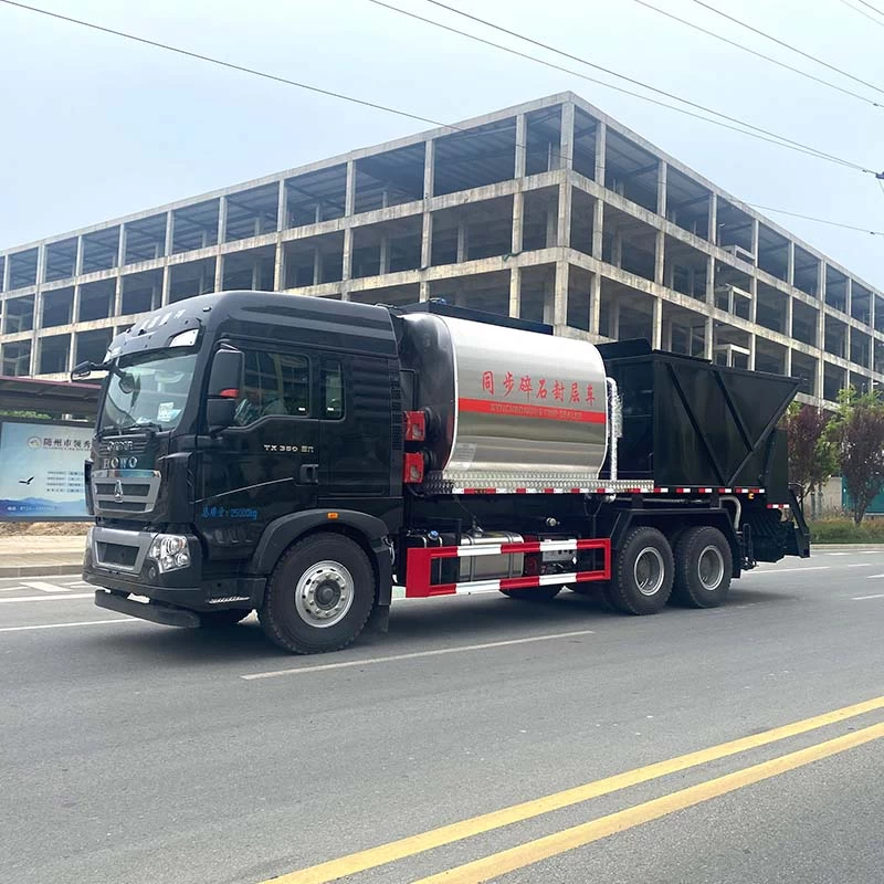 Howo 6x4 Asphalt Gravel synchronous spreader truck Oblique Front View